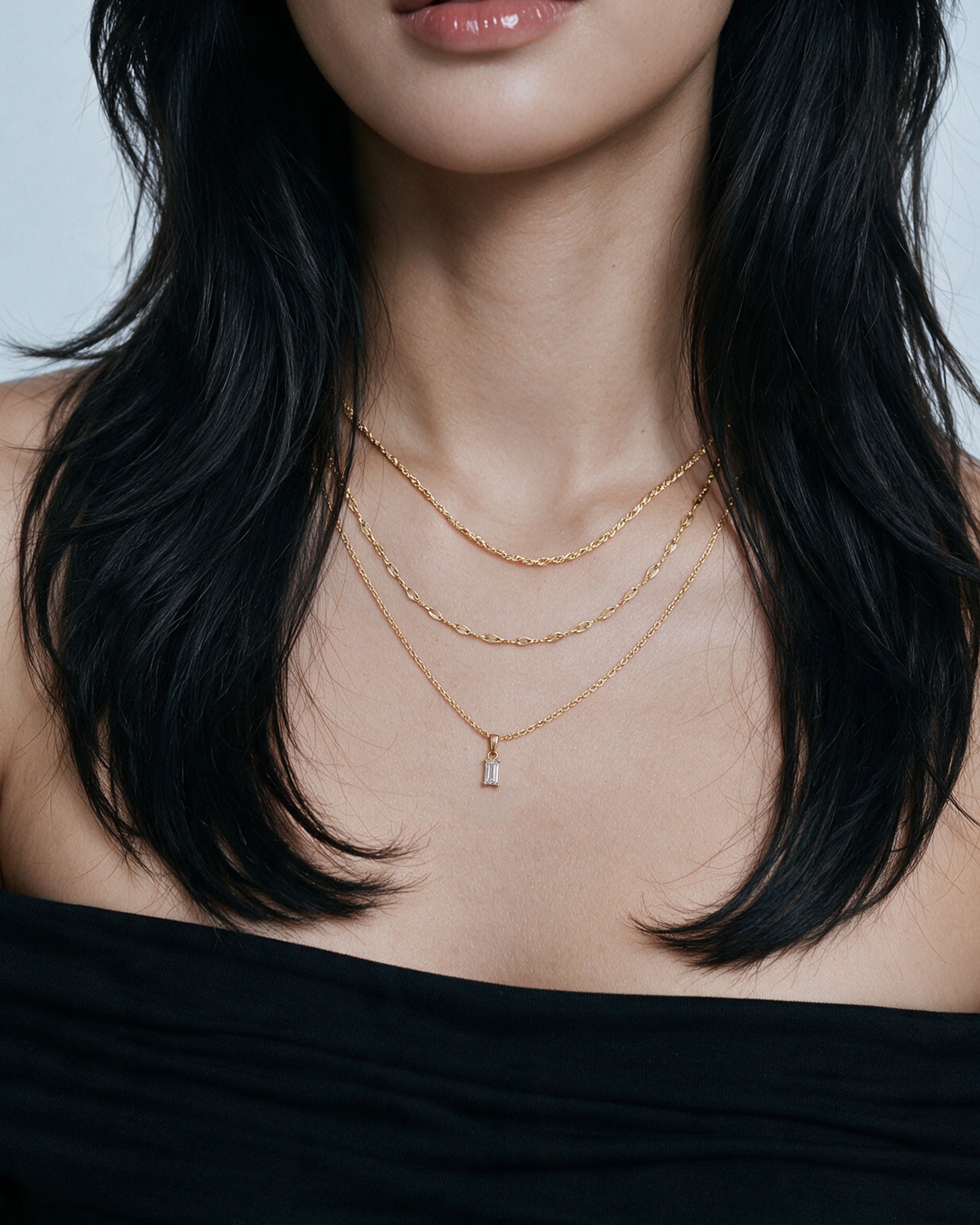 Emerald Cut Necklace Set — White in gold, worn by a model