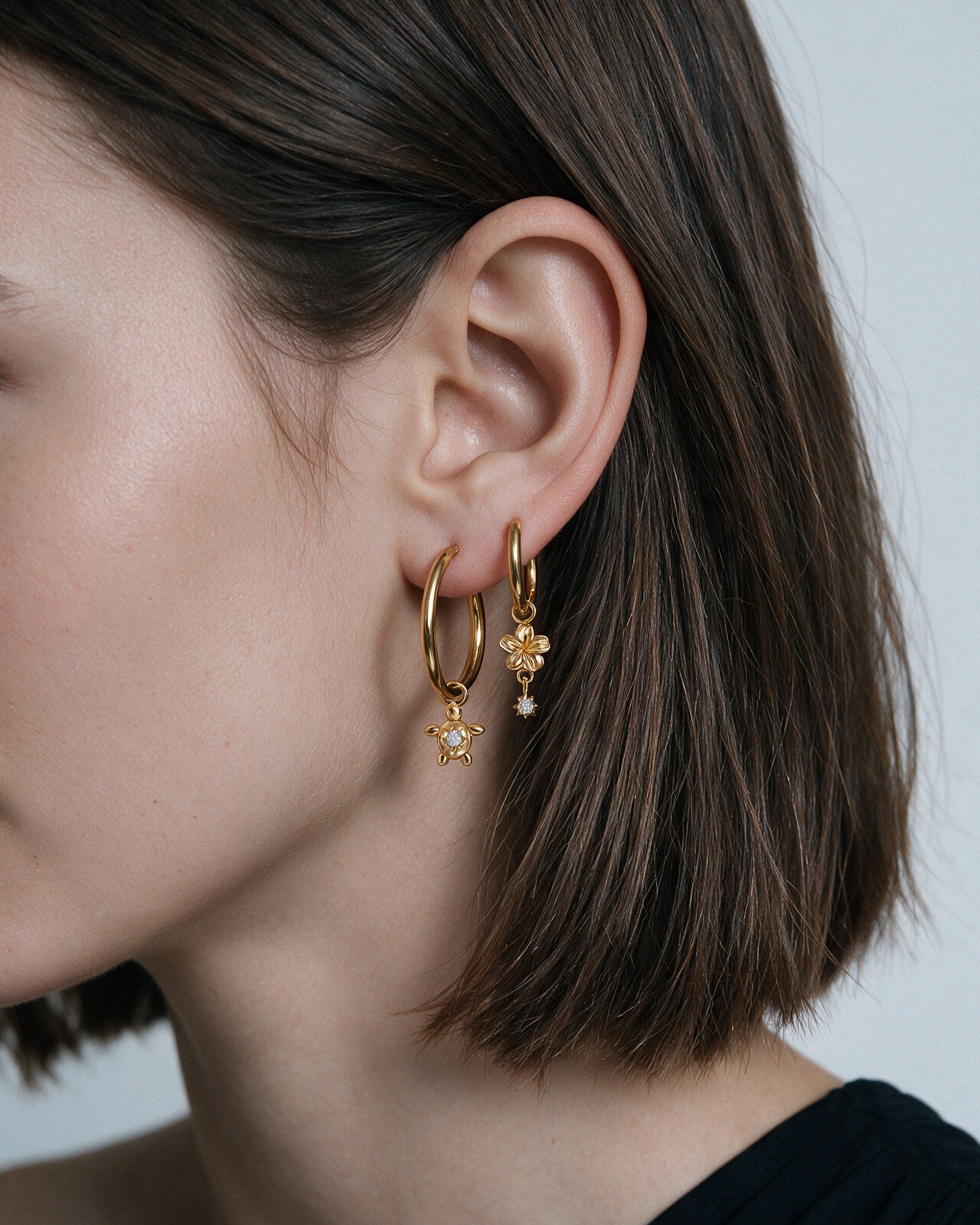 Island Charm Hoop Set in gold, worn by a model