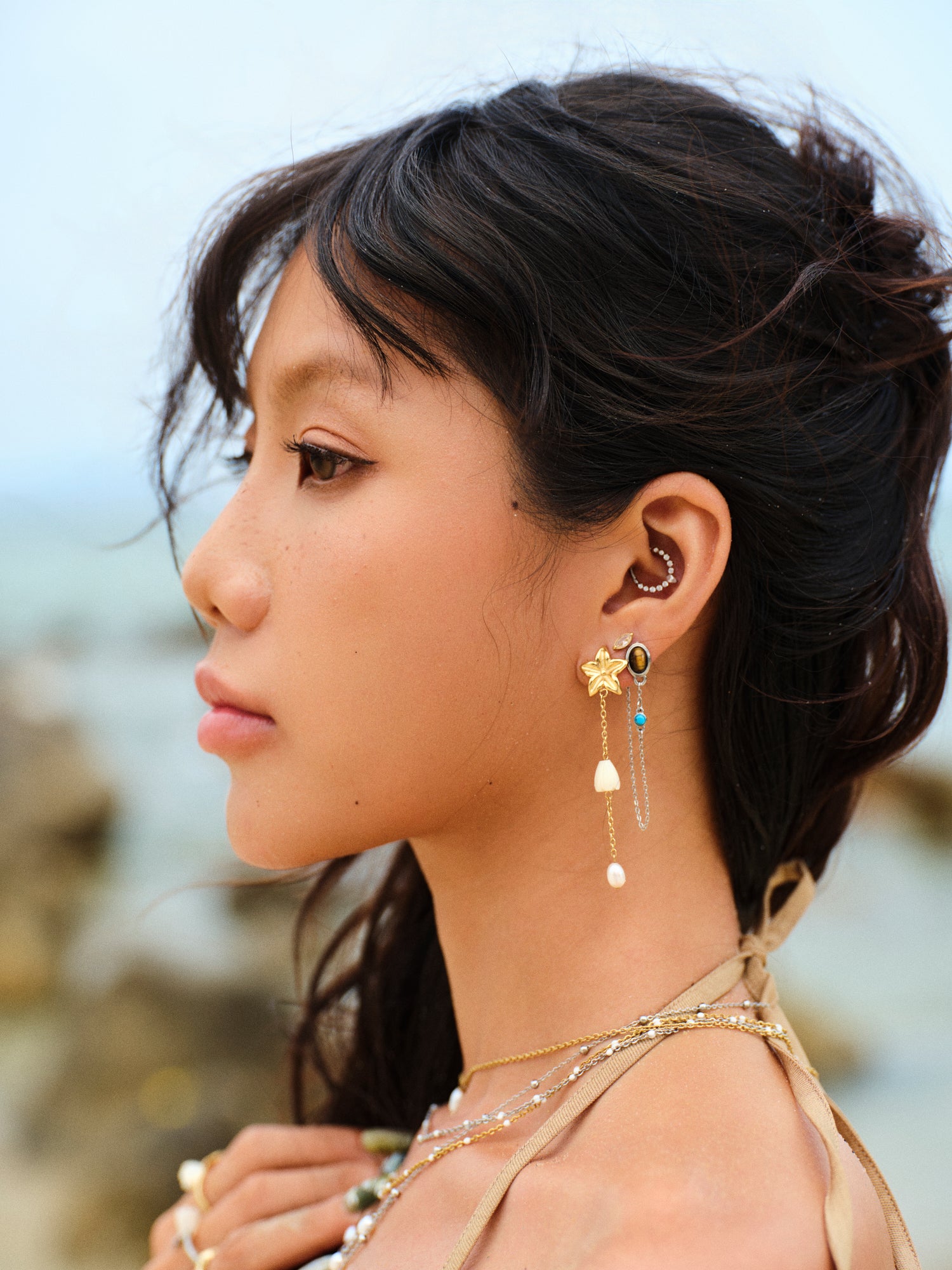 Pikake Bloom freshwater pearl earrings with pikake flower stud and cascading mother of pearl chains