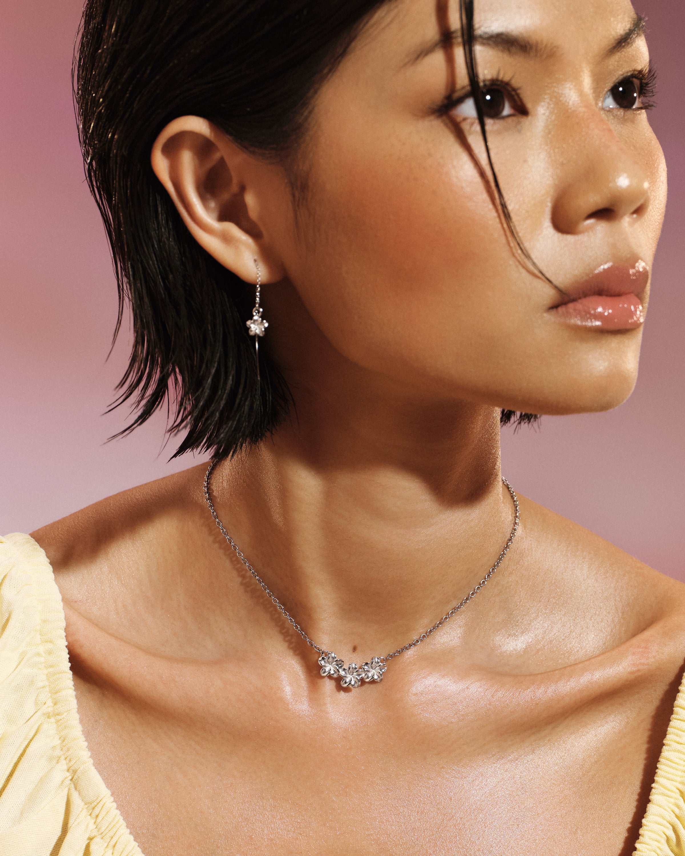 Model wearing the Plumeria Bloom Collar Necklace