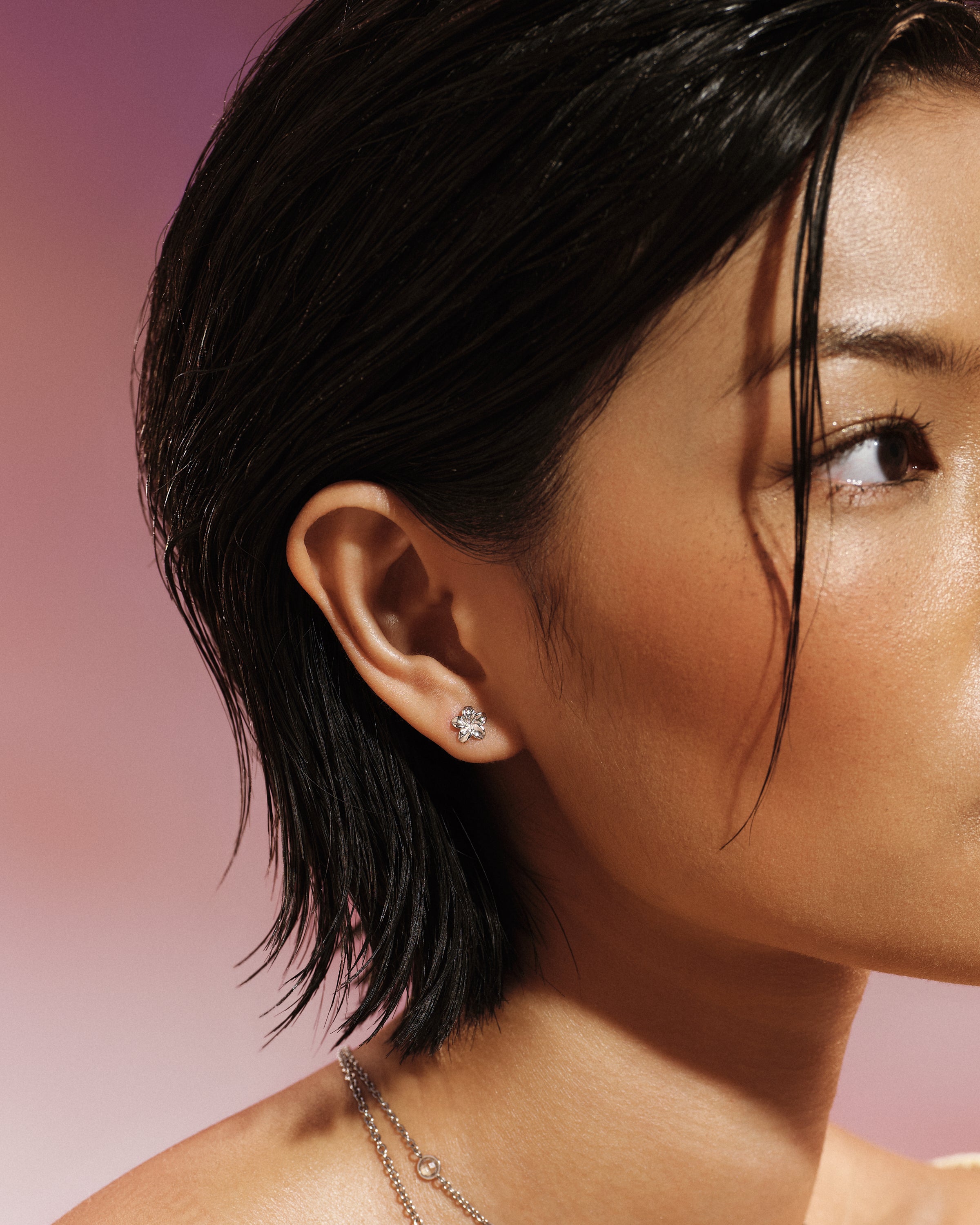 Model wearing the Plumeria Bloom Stud Earring