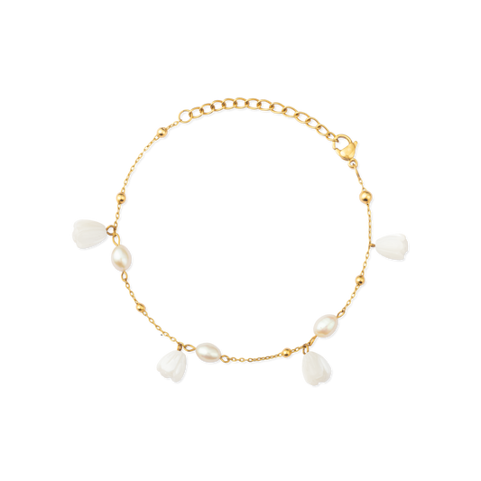 Pikake Bloom freshwater pearl bracelet with alternating pearls and mother of pearl buds on a delicate chain