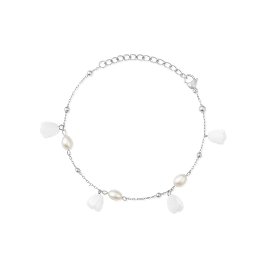 Pikake Bloom freshwater pearl bracelet with alternating pearls and mother of pearl buds on a delicate chain