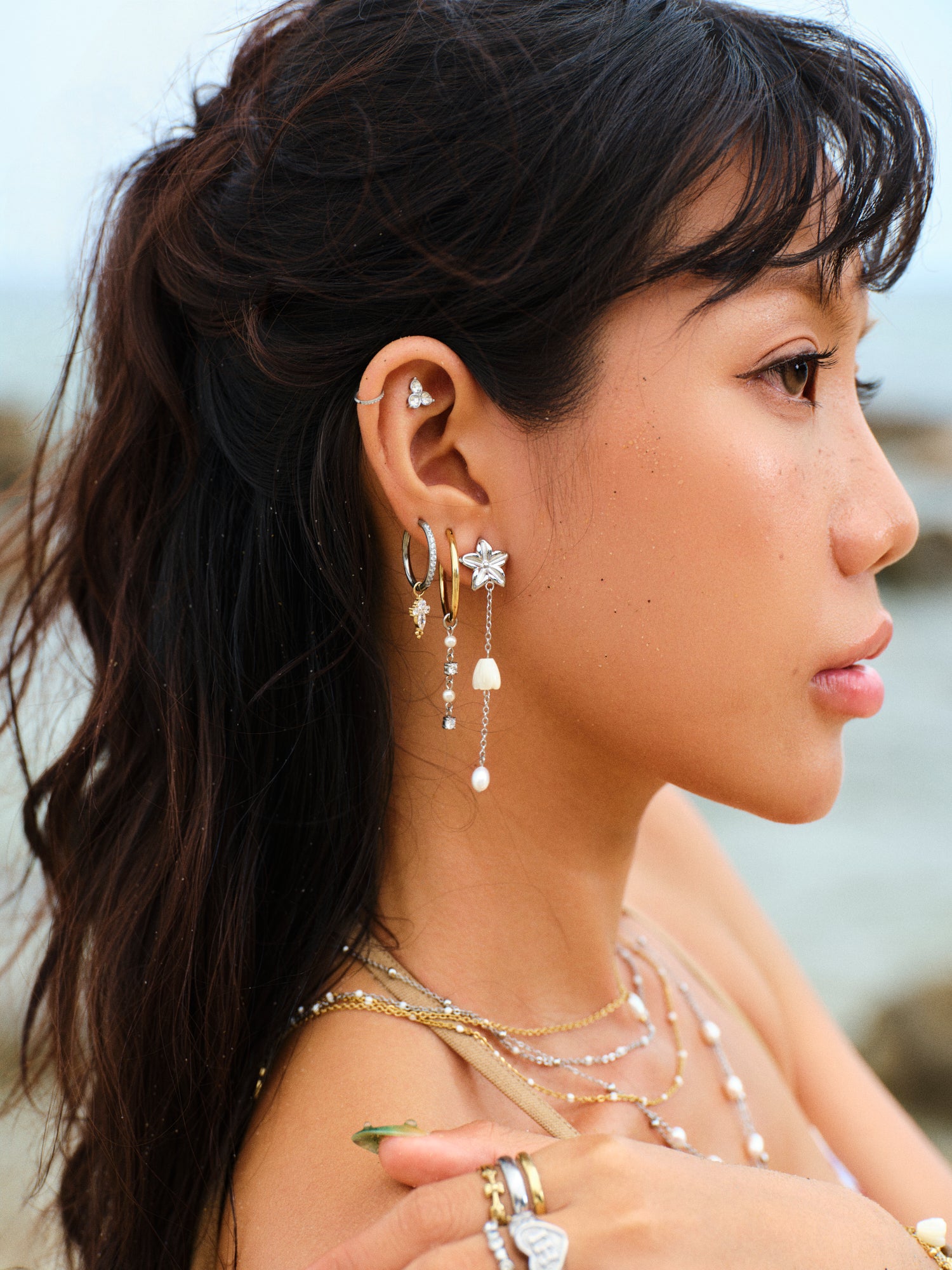 Pikake Bloom freshwater pearl earrings with pikake flower stud and cascading mother of pearl chains
