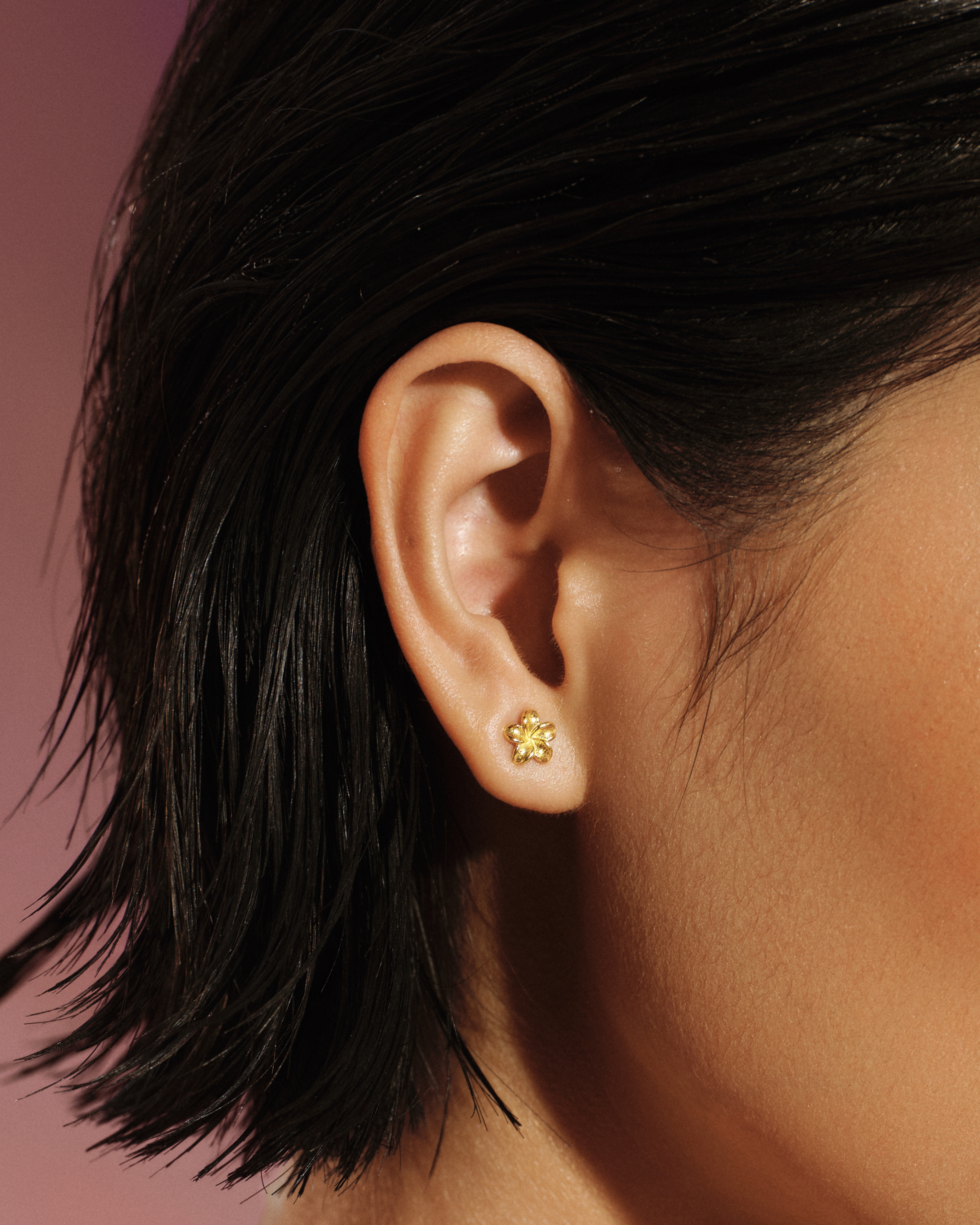 
Model wearing the Plumeria Bloom Stud Earring