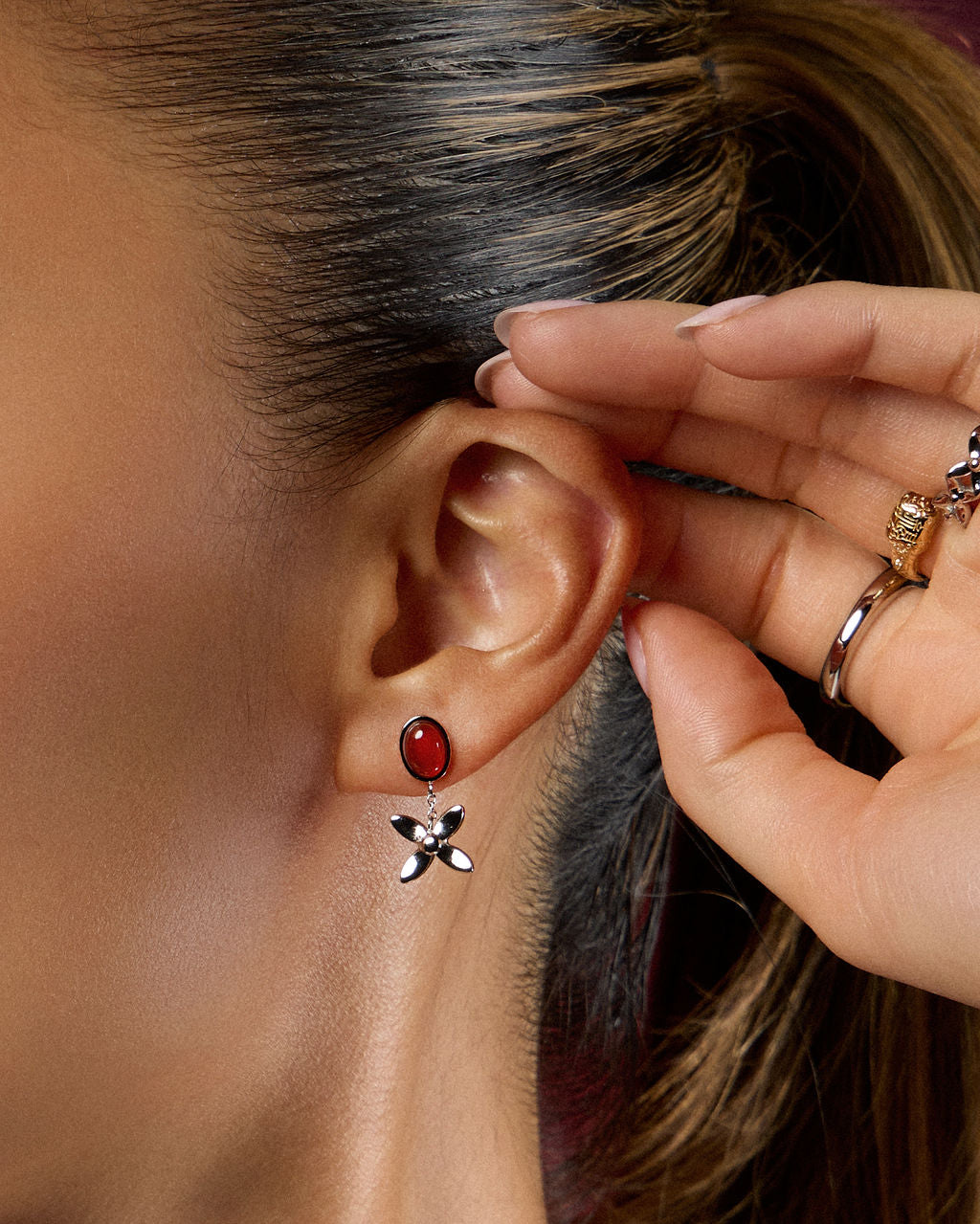 
Model wearing the Scarlet Glow Drop Earring