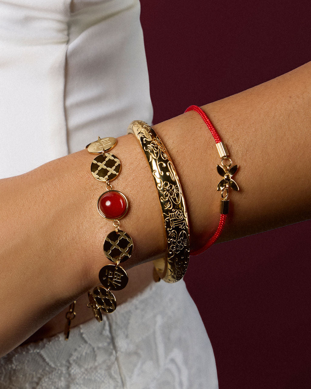 
Model wearing the Scarlet String Bracelet